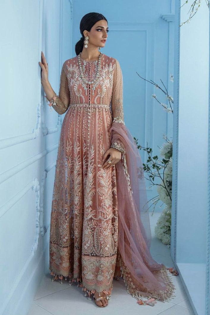 Nura - Luxury Festive Collection 21 | Peach Organza dress is exclusively available @lebaasonline. The Pakistani Bridal dresses online USA includes various brands such as Maria B, Nura by Sana Safinaz. Indian Bridal dresses online UK can be customized for evening & Party wear. Get dresses in UK, USA, France at SALE!