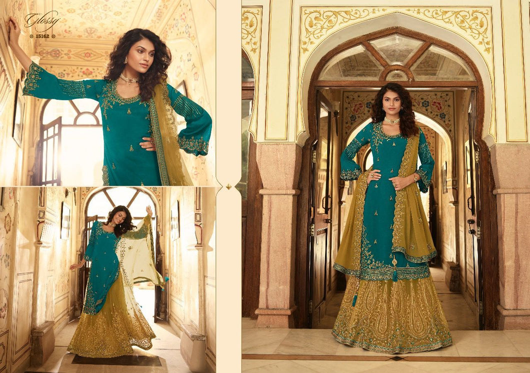 Buy Glossy Rubaab Traditional Lehenga | Rubaab 15162 Turqoise blue color. We have elegant collection of Indian Bridal dresses online USA and Party or Wedding wear of Indian designers like Maisha Viviana, Alizeh. Buy unstitched or even customized Anarkali Lehnga Indian Wedding Dresses online UK from Lebaasonline.co.uk