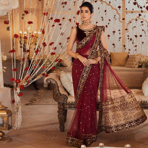 NOOR BY SAADIA ASAD | WEDDING COLLECTION '21 | 05 Maroon Saree Wedding dress is available @lebaasonline. The Wedding dresses online UK is available for Party/Evening wear. Customization of various Bridal outfits can be done. Various top brands such as Maria B, Sana Safinaz, Asim Jofa is available in UK, USA, France