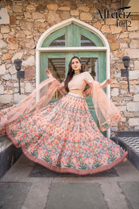 Buy Alfaaz Traditional Lehenga Choli | 4002 Peach Floral Print. We have elegant collection of Indian Bridal dresses online UK and Party or Wedding wear of Indian designers like Maisha Viviana, Alizeh. Buy unstitched or even customized Anarkali Lehnga Indian Wedding Dresses online UK from Lebaasonline.co.uk