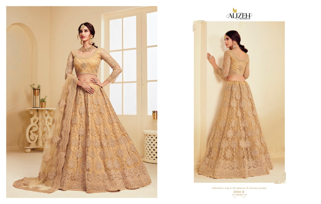Buy Bridal Wedding Lehenga | Alizeh Lehenga The White Bride | 1004 E Golden color Lehenga The wedding collection dresses of Alizeh Embroidered dresses, party wear dresses 2020 pakistani are very much trending these days. Buy unstitched or even customized Pakistani clothing from Lebaasonline.co.uk in USA, Spain, UK