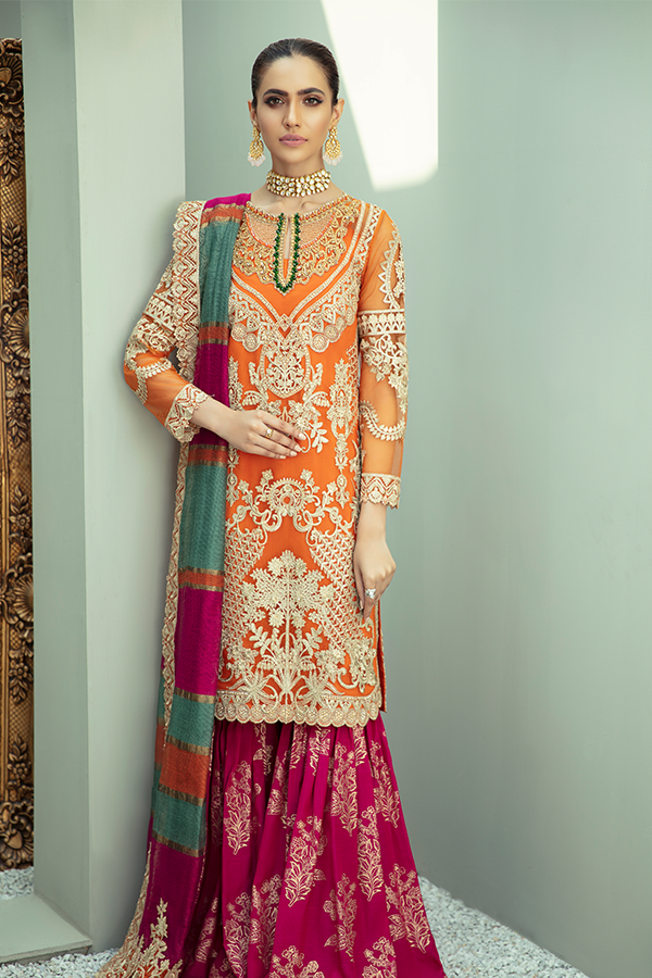 IMROZIA PREMIUM EMBROIDERY  I-136 Orange Chiffon dress pak exclusively from us We are largest stockist of Imrozia Premium Chiffon collection Maria b and all other Pakistani designer clothes The fine embroidery and subtle color of the dress are great combinations for Eid dresses Buy from Lebaasonline in UK Spain Austria