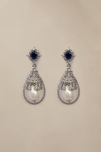 Buy Maria B Jewelry | Zircon Fine Jewelry | JER-042-Sapphire Blue with Rhodium Lavishly exaggerated high quality Zircon fine earring This jewelry is from Maria B Heritage Collection 2022 in the UK USA and Australia. We are the largest stockist of Maria B Pakistani Jewelry, Ring Jhoomar Ranihaar necklace and earrings.