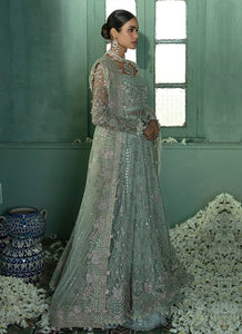 SORAYA PK | Wedding Collection 2023 SORAYA PETULLA- FESTIVE Petulla showcases a majestic festive approach layered in ice blue and mint green shades. A net pishwas embellished with multi-hued crystals, pitta, pearls, and gota work paired with crushed lehenga.